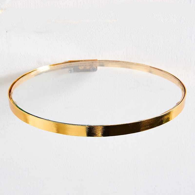 Glass shelf with brass ring for modern home decor